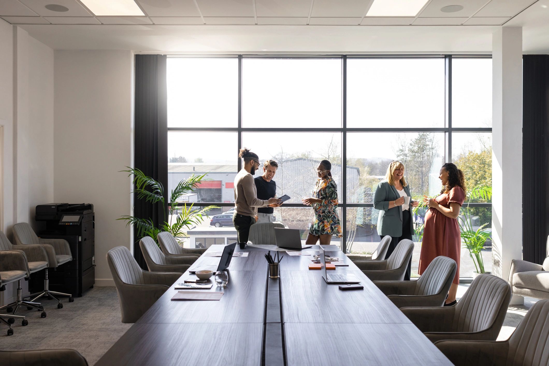 Professional colleagues in discussion during a business meeting
