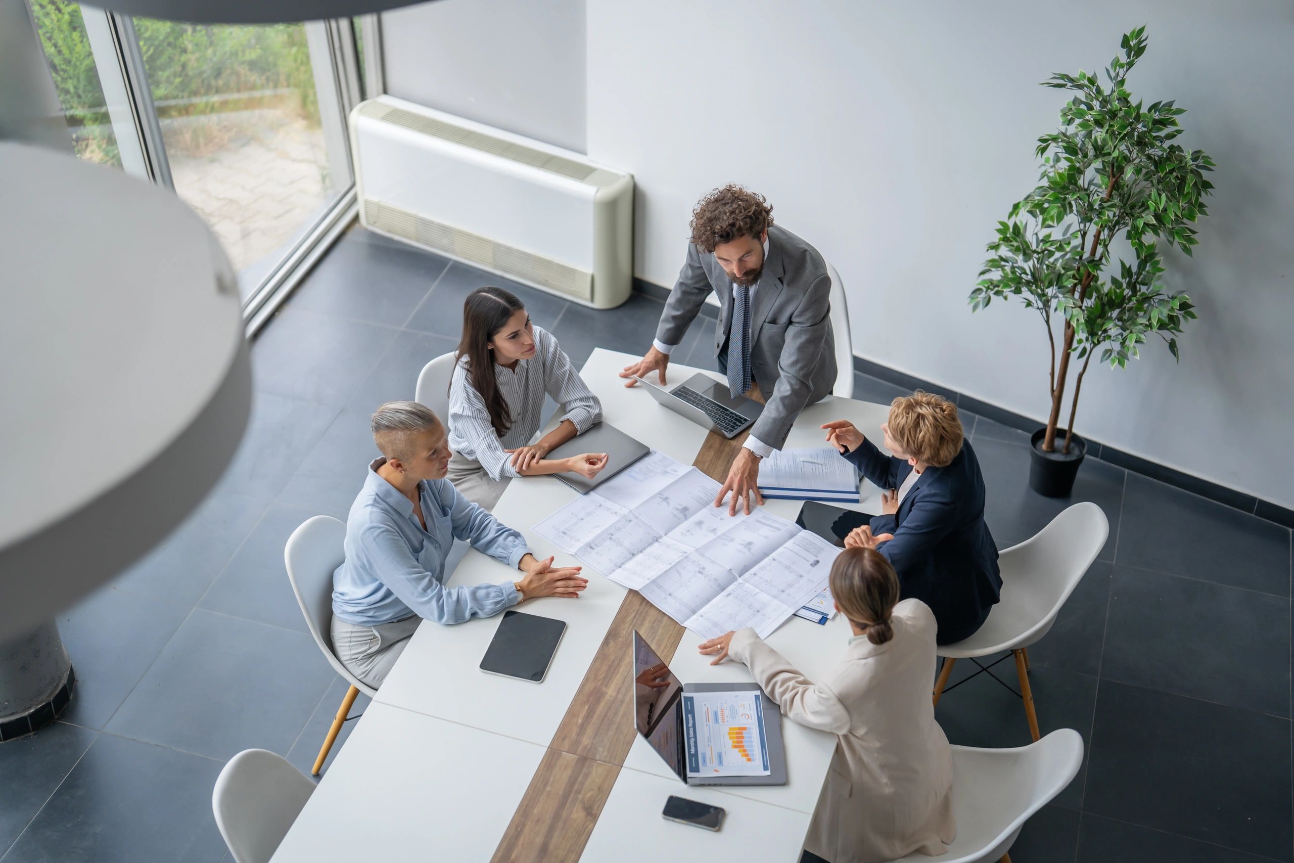 Professional team collaborating over documents